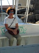 Gloria sits in the women's section of the Nile ferry