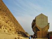 Khufu took apart and buried full-sized ceremonial boats.  <br>One has been dug up, put back together and displayed in this building next to his pyramid.