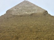 Khafre's pyramid is recognizable by the facing stone that remains at the top.