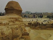 The Sphinx is just at the edge of Giza, a neighborhood of Cairo.