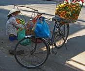 On the street - actually on a tiny stool