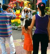 Taking a photo with the plastic Disneycharacters
