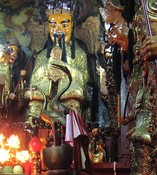 The Jade Emperor Pagoda is crammed with statues, circa 1900