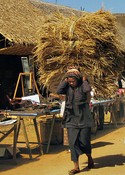 Carrying off straw from the Intain Market
