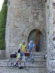 Cyclists posed at the entrance to the Castello. (369x492, 92.8 kilobytes)
