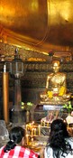 There are statues and chapels around/below the Reclining Buddha.