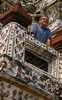 Wat Arun - Max leans over a railing (353x569, 91.9 kilobytes)